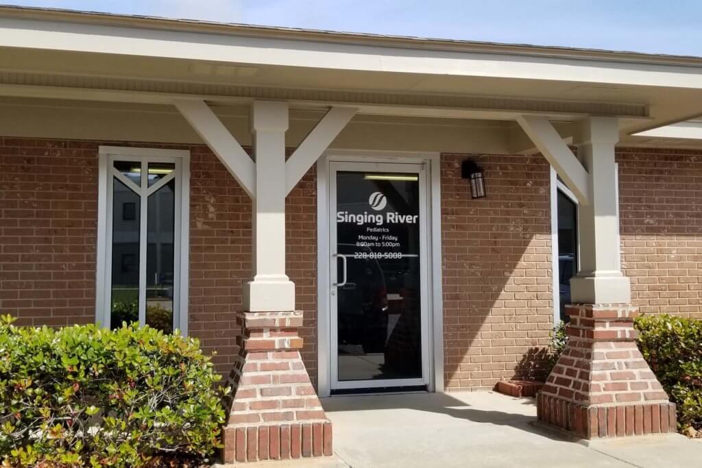 Facade of outpatient pediatric clinic in Ocean Springs, Mississippi called Singing River Pediatrics.